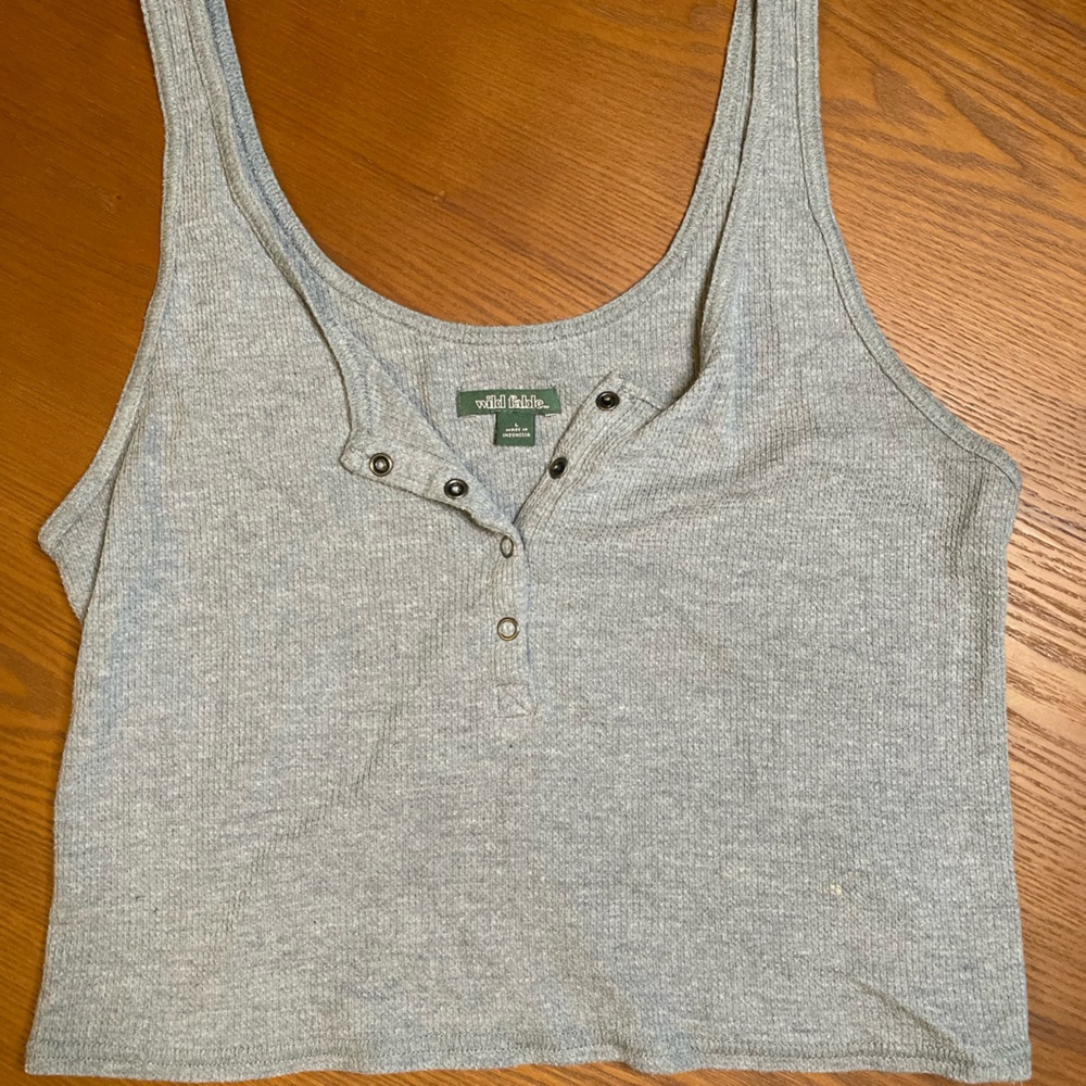 Grey cropped tank top.
